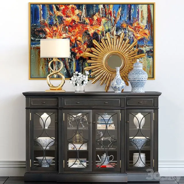 A_chest_of_drawers_with_a_collection_of_decor,_a_lamp_and_a_set 