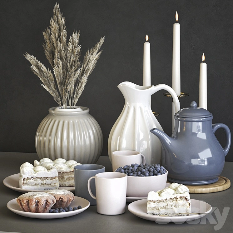 A set of dishes IKEA with cake, muffins and dried flowers 